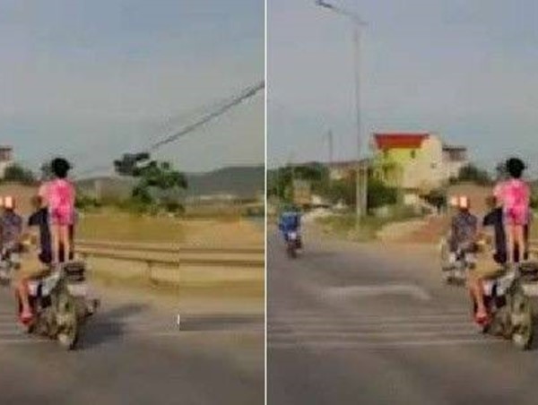 Clip: Hoảng hốt với cách phóng xe để con đứng trên yên của người bố