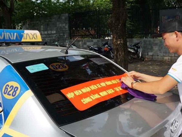 Cuộc chiến Grab và taxi truyền thống bao giờ mới kết thúc?