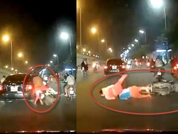 Clip: Ô tô tông vào 2 vợ chồng chở con nhỏ té ngã rồi bỏ chạy