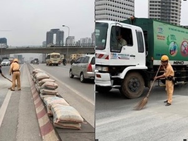 Cảnh sát giao thông dọn dẹp hơn 1 tấn xi măng rơi ra đường