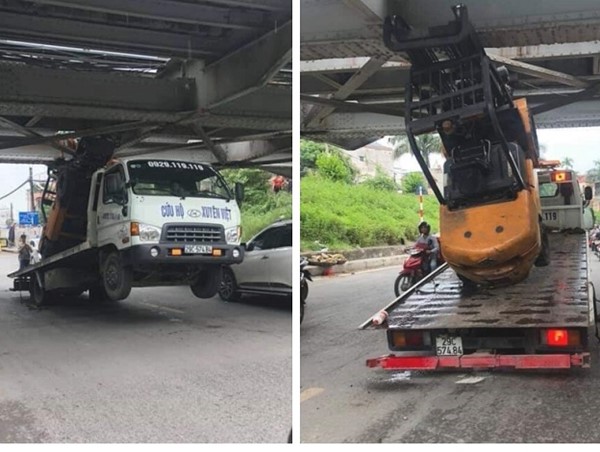 Xe nâng mắc kẹt khiến xe tải “lơ lửng” dưới gầm cầu Long Biên