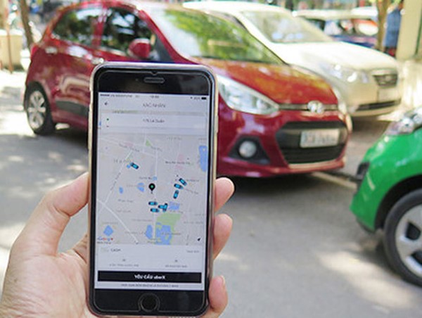Định danh taxi công nghệ: "Phép thử" cho các bộ ngành