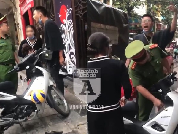 Không đội mũ bảo hiểm, nam thanh niên thể hiện thái độ "xấu xí" khi bị xử lý