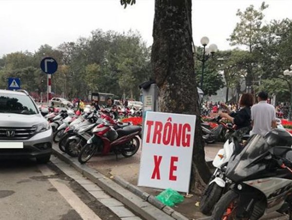 Bãi trông giữ xe tự phát ngày Tết có thể bị phạt tới 40 triệu đồng