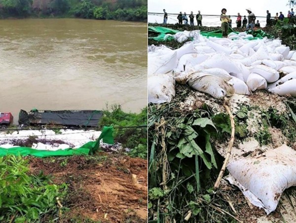 Tránh xe đi ngược chiều, xe đầu kéo chở đầy gạo lao xuống sông