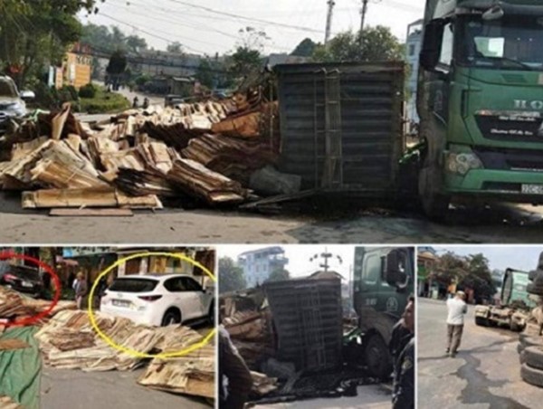 Xe đầu kéo lật khi vào cua, đè trúng 2 "xế hộp" đang đỗ bên đường