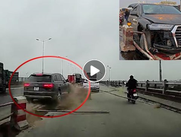 [Clip]: Khoảnh khắc ô tô Audi Q7 tông dải phân cách cầu Thanh Trì