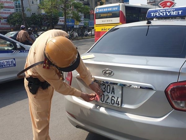 Đề xuất tăng mức xử phạt hành vi che biển số ô tô