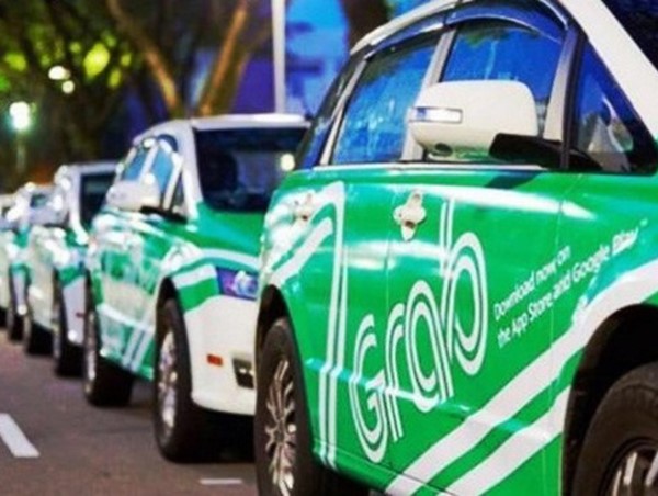 Vì sao taxi truyền thống phản đối bỏ quy định taxi công nghệ phải đeo mào?