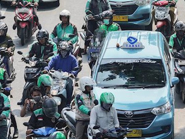 Grab, Go-Jek lo sợ hiệu ứng domino từ luật Uber tại Mỹ