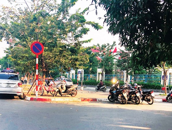 Bao giờ xử lý dứt điểm vi phạm tại nút Giải Phóng - Phố Vọng?