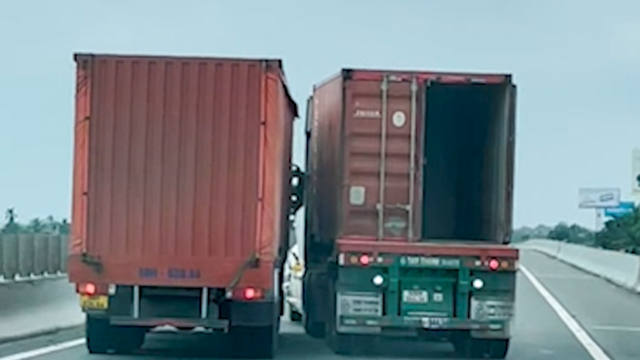 Xe tải và xe container đánh võng, lạng lách trên cao tốc