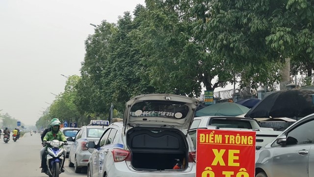 Cấp phép trông giữ xe để chấm dứt lộn xộn trên đường Phạm Tu