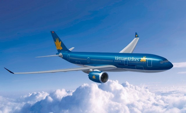 Chuyen bay cua Vietnam Airlines lui thoi gian khoi hanh de doi khach noi chuyen - Hinh anh 1