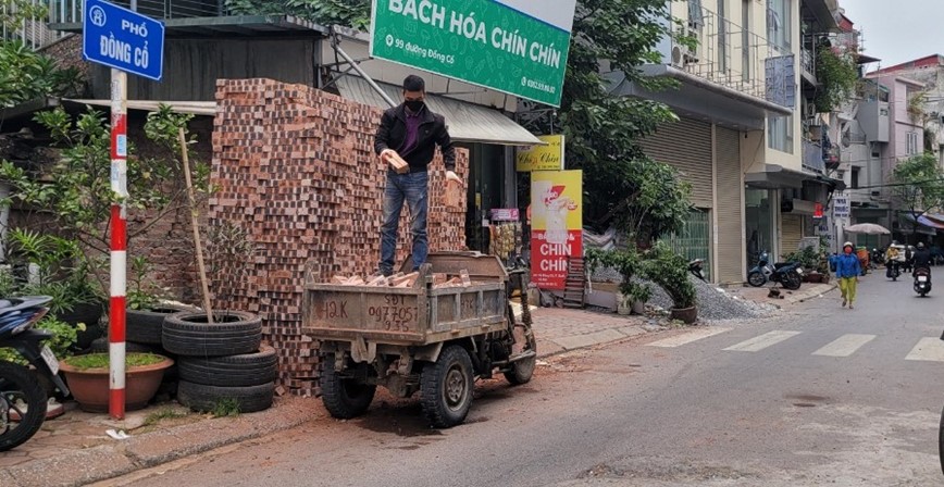 Quan Tay Ho: Pho Dong Co tran lan vi pham trat tu do thi - Hinh anh 1