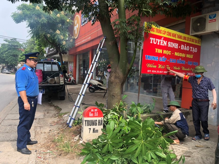 Quyet liet tra lai hanh lang an toan giao thong tai quoc lo 32: Nguoi dan nhiet liet huong ung - Hinh anh 1