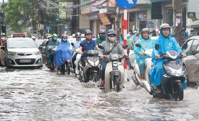 Lam gi de giam thieu ung ngap tai Ha Noi trong mua mua? - Hinh anh 1