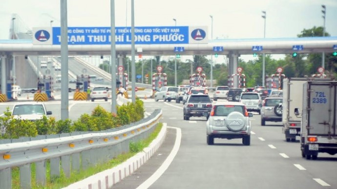 Lai xe doi tra tien qua the Etag tren cao toc TP Ho Chi Minh - Long Thanh - Dau Giay - Hinh anh 1