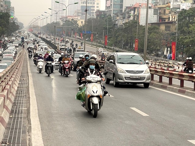 Ha Noi: Duong pho nhon nhip tro lai, cua ngo un u nhe - Hinh anh 8