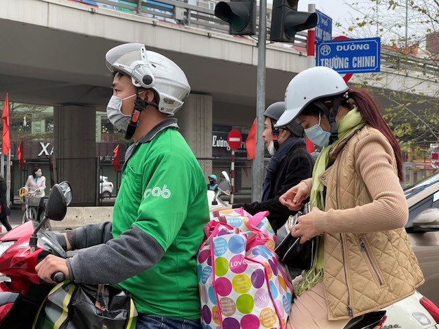 Ha Noi: Duong pho nhon nhip tro lai, cua ngo un u nhe - Hinh anh 10