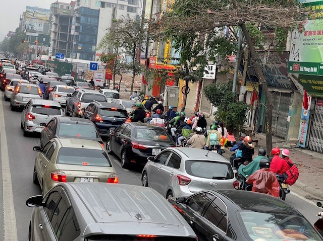 Ha Noi: Duong pho nhon nhip tro lai, cua ngo un u nhe - Hinh anh 7