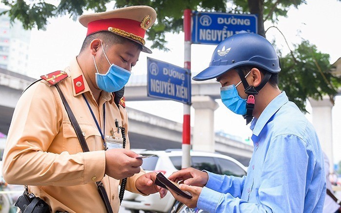 Vi sao van nen giu quy dinh bat buoc mua bao hiem xe may? - Hinh anh 1