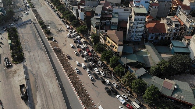 (Anh): Toan canh tuyen duong Le Quang Dao phuc vu thi cong duong dua F1 - Hinh anh 6