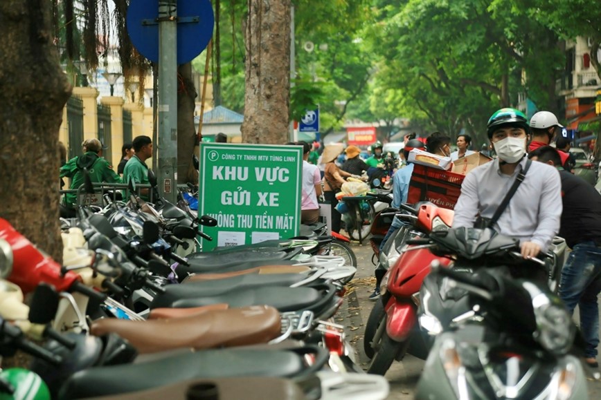 Thi diem trong giu xe khong dung tien mat: loi ich cho ca ba ben - Hinh anh 2