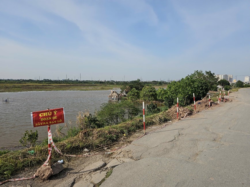 Tam cam phuong tien di chuyen tren de Yen Nghia do xuat hien 3 diem sut lun - Hinh anh 3