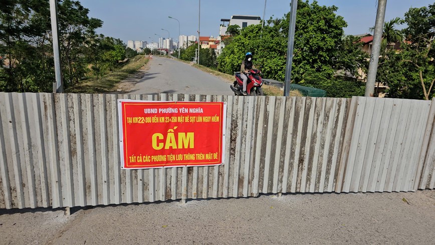 Tam cam phuong tien di chuyen tren de Yen Nghia do xuat hien 3 diem sut lun - Hinh anh 4