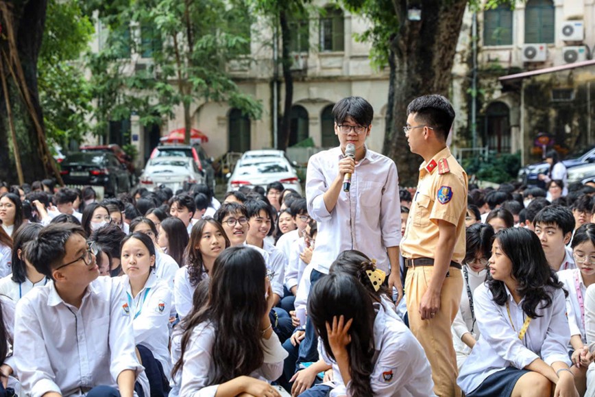 Ha Noi: tuyen truyen trien khai Luat Trat tu, an toan giao thong duong bo - Hinh anh 1