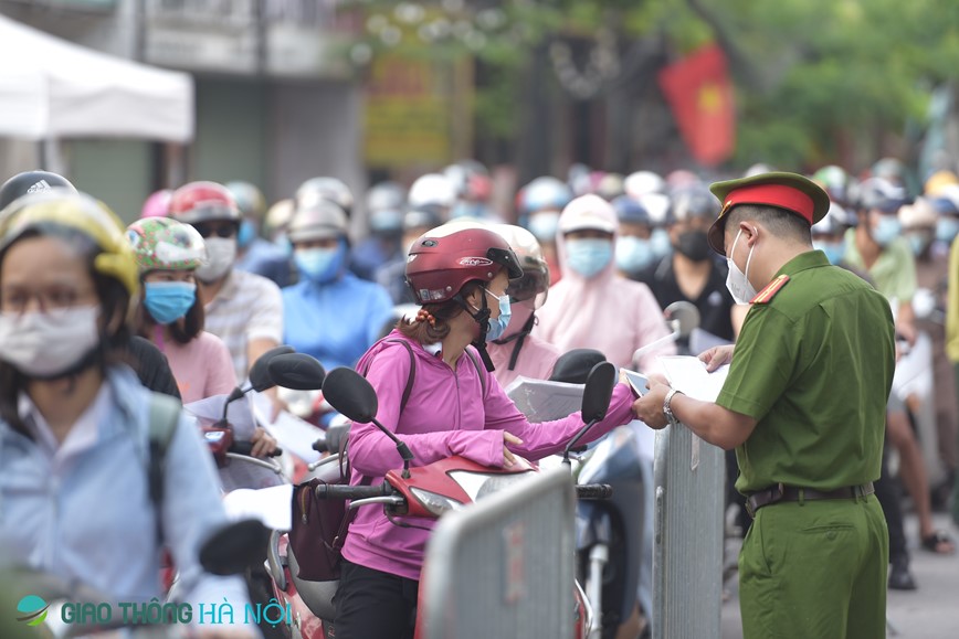 Huyen Thanh Tri: Siet chat phong chong dich, yeu cau nguoi di duong co them lich lam viec - Hinh anh 9