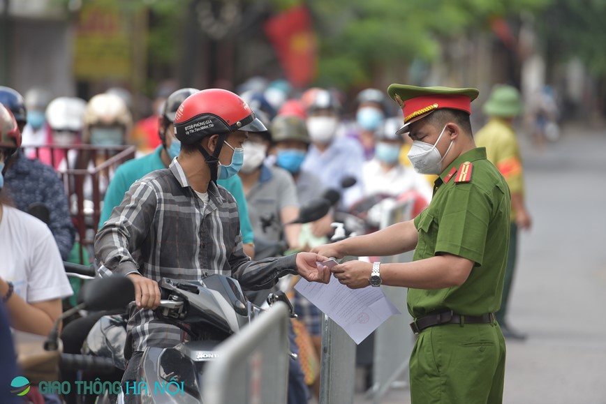 Huyen Thanh Tri: Siet chat phong chong dich, yeu cau nguoi di duong co them lich lam viec - Hinh anh 10