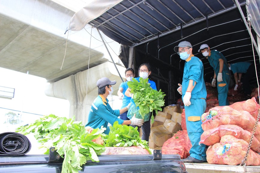 Quy trinh van chuyen, giao nhan hang hoa bao dam an toan phong, chong dich Covid-19 tai Ha Noi - Hinh anh 1