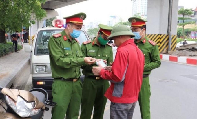 Ha Noi: Day manh tuyen truyen phap luat ve phong, chong dich benh Covid-19 voi nhieu hinh thuc - Hinh anh 1