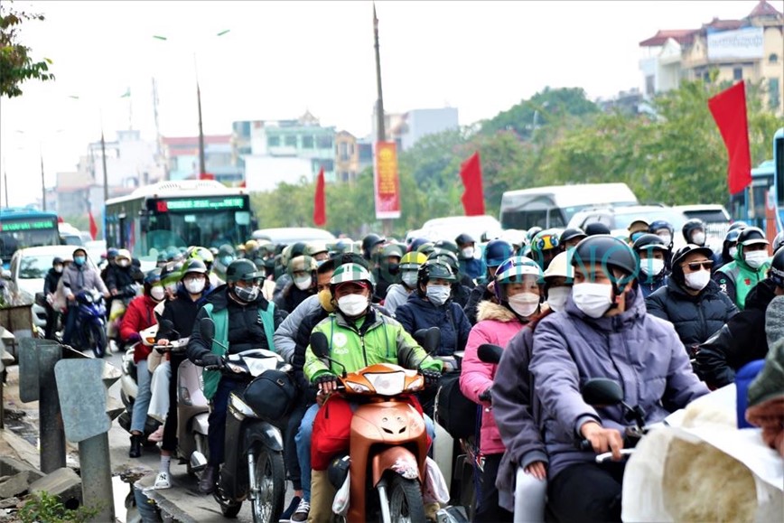 Nguoi dan linh kinh do dac tro lai Thu do sau Tet - Hinh anh 1