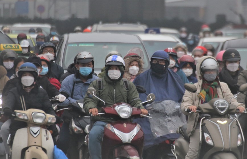 Duong pho Ha Noi un tac keo dai sau ky nghi Tet Nguyen dan - Hinh anh 8