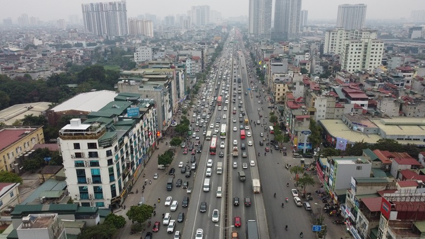 Nguoi dan roi Thu do ve que an Tet, cua ngo Ha Noi un u - Hinh anh 7