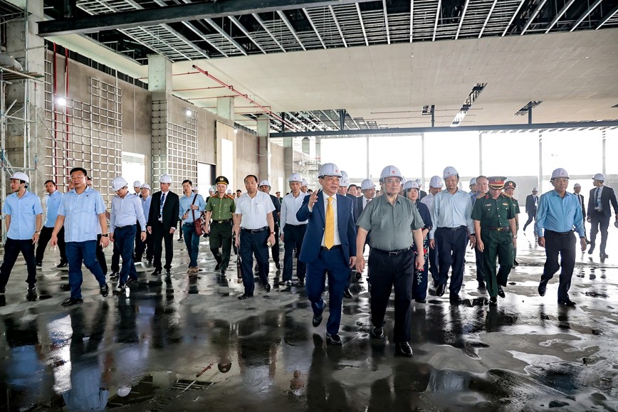Thủ tướng kiểm tra tiến độ dự án Trung tâm Hội chợ Triển lãm Quốc gia - Hình ảnh 5 Thu tuong kiem tra tien do du an Trung tam Hoi cho Trien lam Quoc gia - Hinh anh 5
