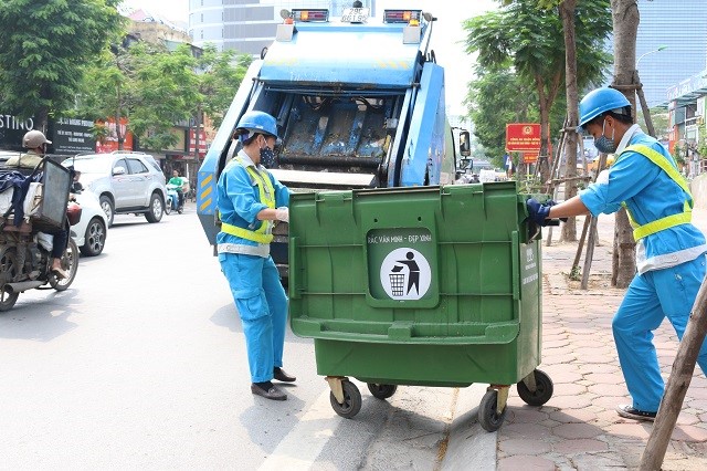 Ha Noi: Phan luong, luu tru rac tam thoi - Hinh anh 2