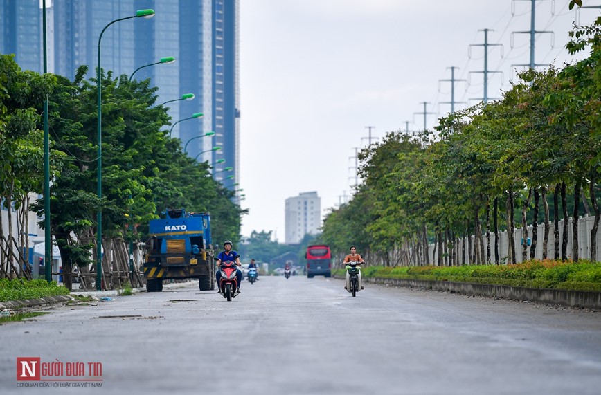 Ngon ngang rac thai, vat lieu tren tuyen duong noi hai vanh dai sau 5 nam dang do - Hinh anh 3