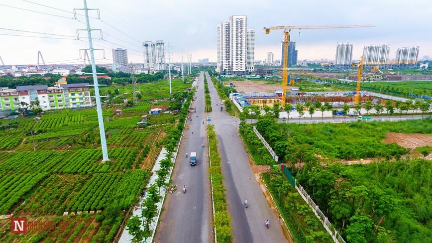 Ngon ngang rac thai, vat lieu tren tuyen duong noi hai vanh dai sau 5 nam dang do - Hinh anh 2