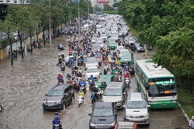 TP Ho Chi Minh: Loay hoay gan 20 nam van phai dung ngan sach de sua duong Nguyen Huu Canh - Hinh anh 1